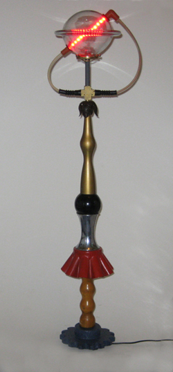 A Harry Anderson lamp that combines hand blown glass with found objects and LEDs